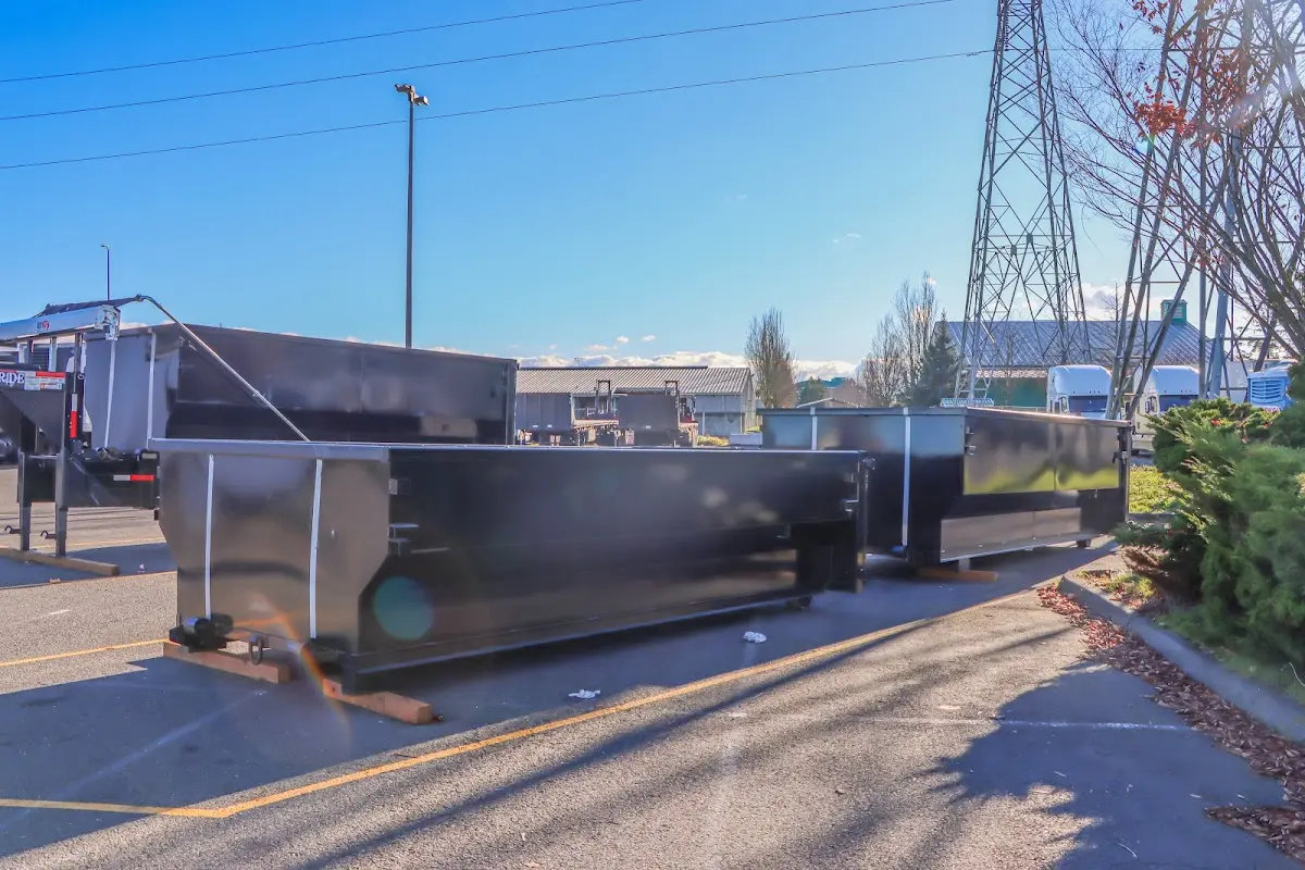 Roll-off dumpster ready for waste disposal at job site for 2 Yard Dumpster Rental in Escalon